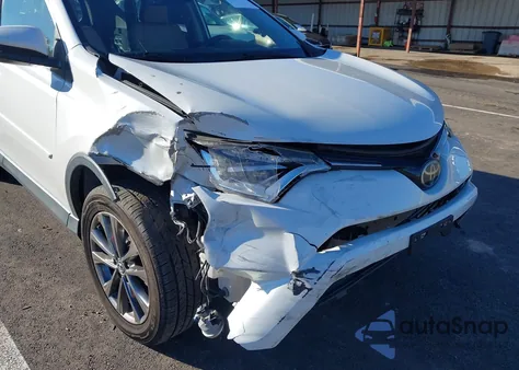 2018 Toyota Rav4 Limited z USA, uszkodzony, nr VIN JTMYFREV6JJ730453